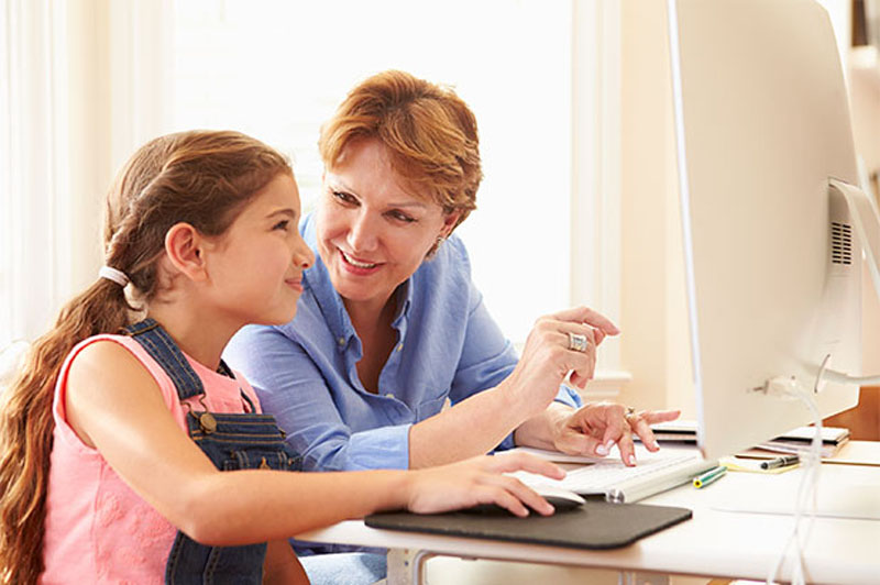 Grandmother and Daughter Learning